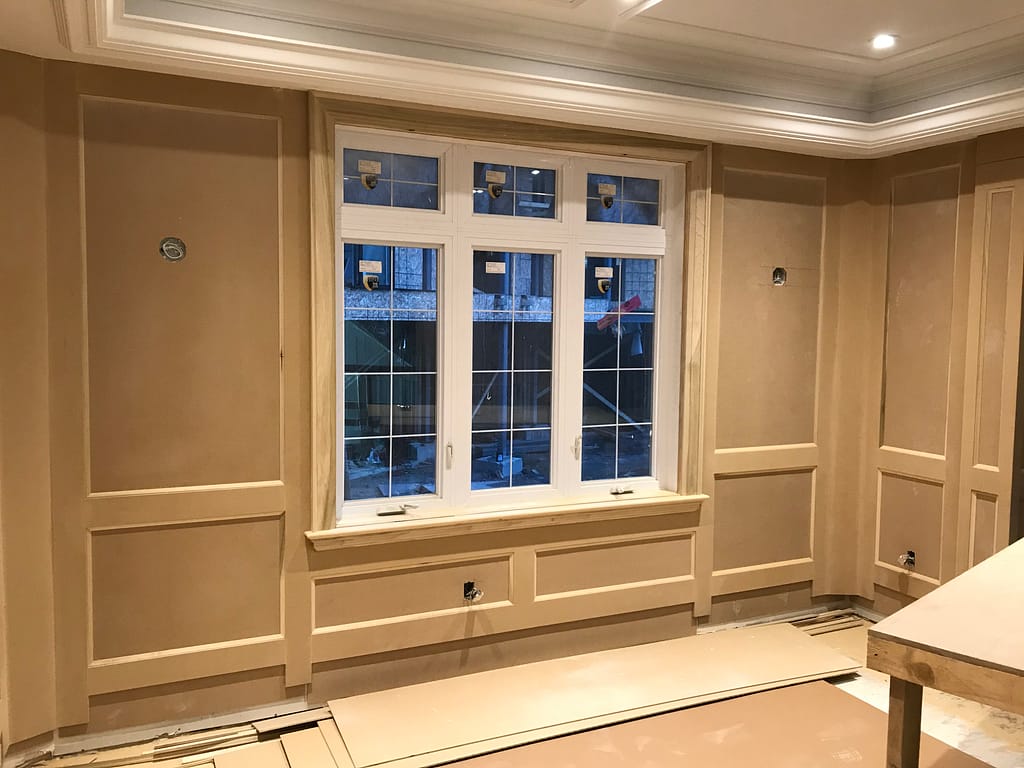 Wall panel installed by a finish carpenter in Oakville home