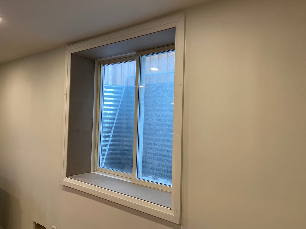 Window framed and trimmed by a finish carpenter in Milton