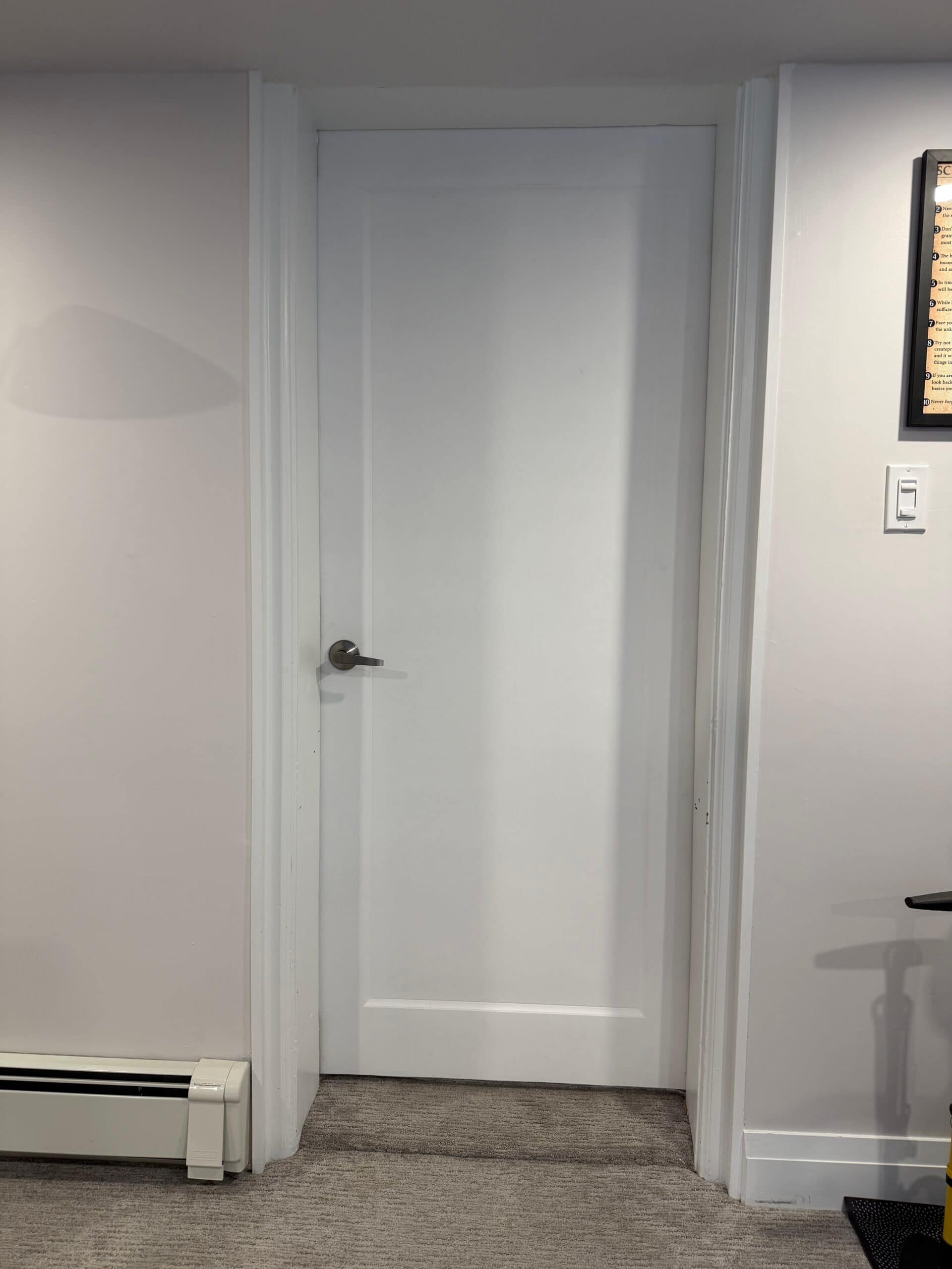Custom-Fitting a Basement Door to an Uneven Opening in Kitchener
