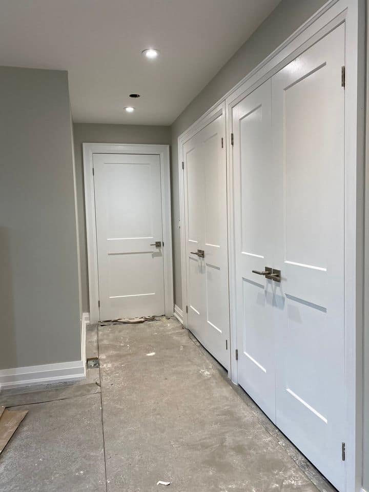Two-panel shaker style interior doors installed with clean trim detail in Guelph