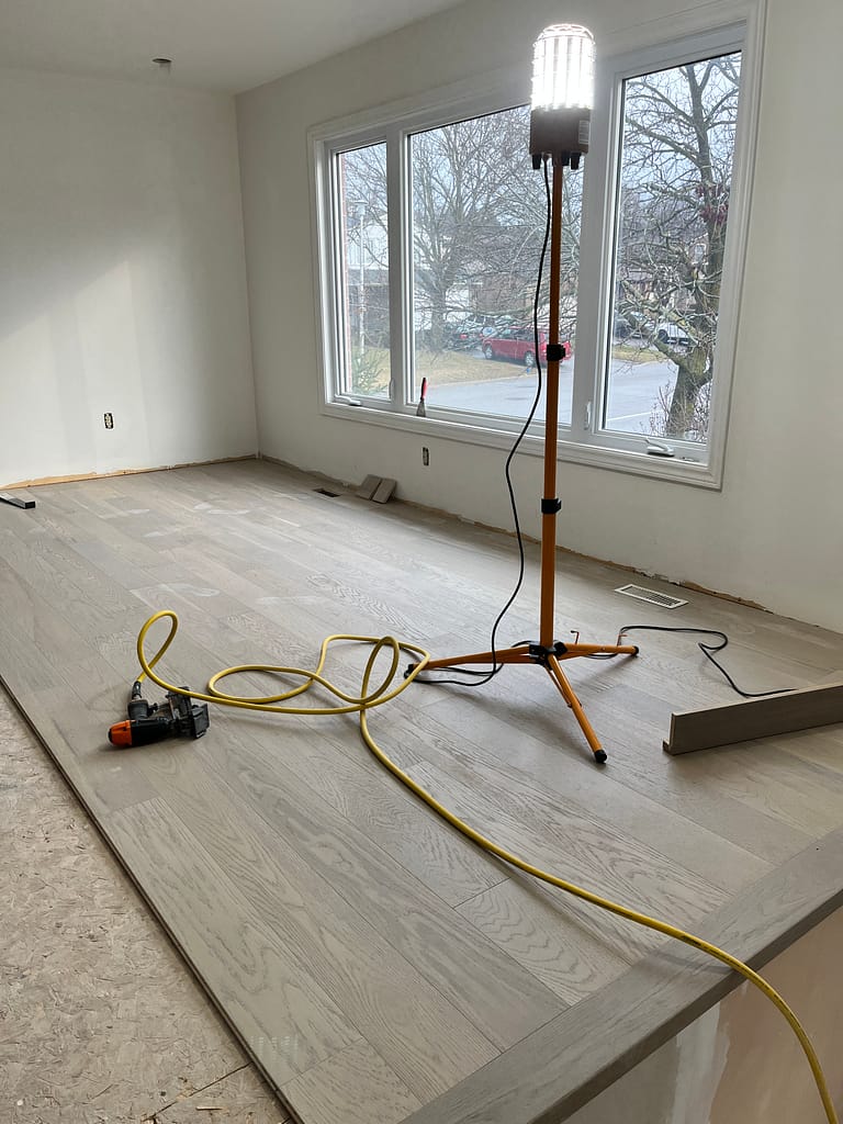 Engineered hardwood flooring installation process by a finish carpenter