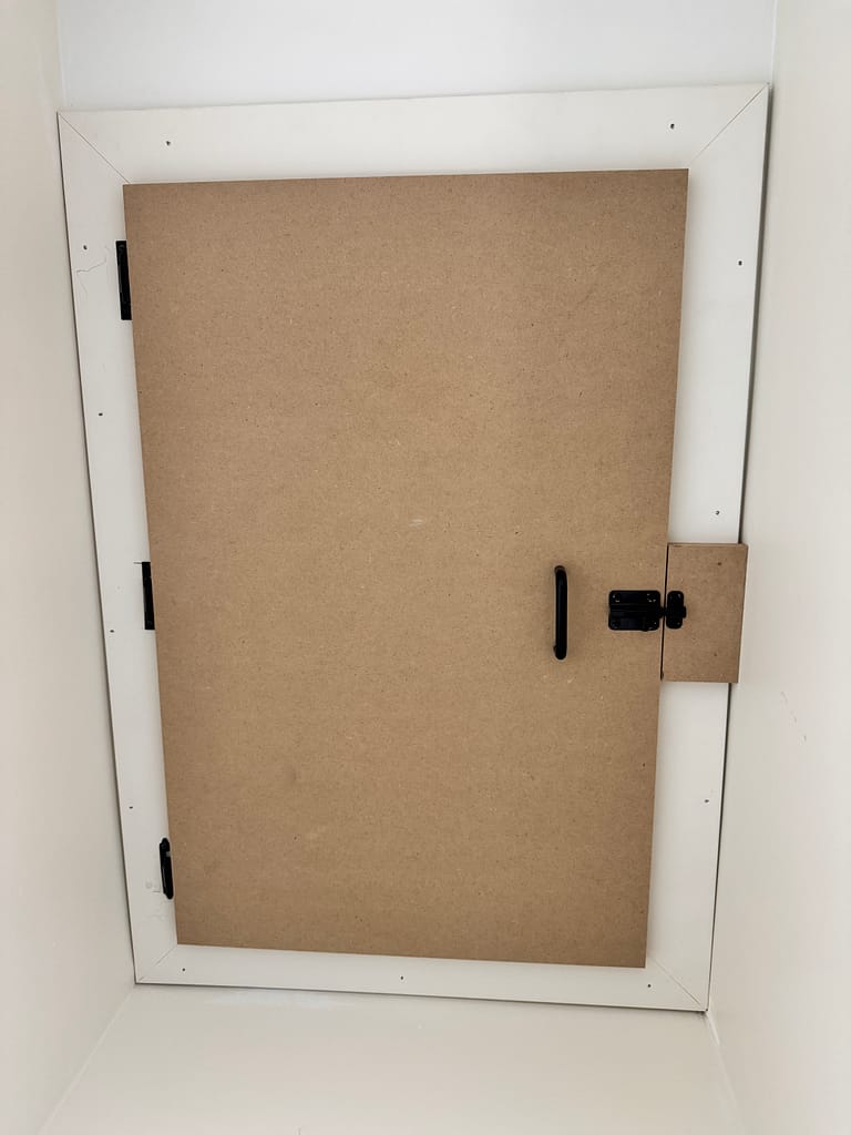 Custom attic door built and installed by a finish carpenter