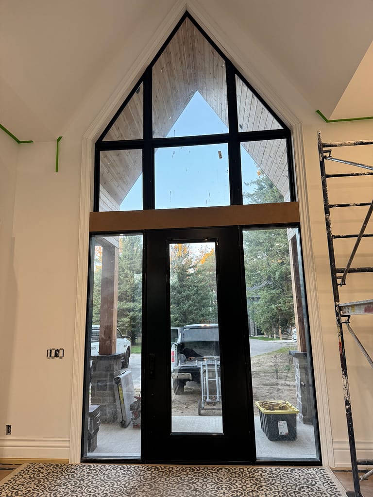 High ceiling door and window casing installed by finish carpenter Jack Cenk Ozer at Wood Job Finish Carpentry.