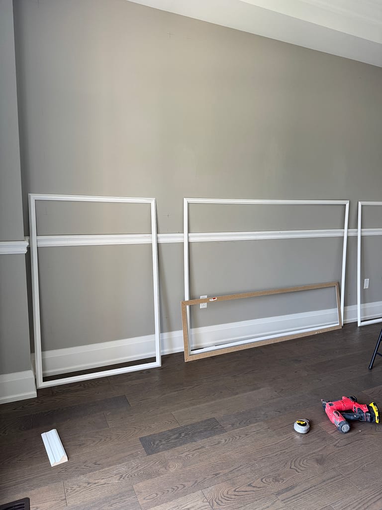 Accent wall panel preparation by Wood Job Finish Carpentry in Oakville home