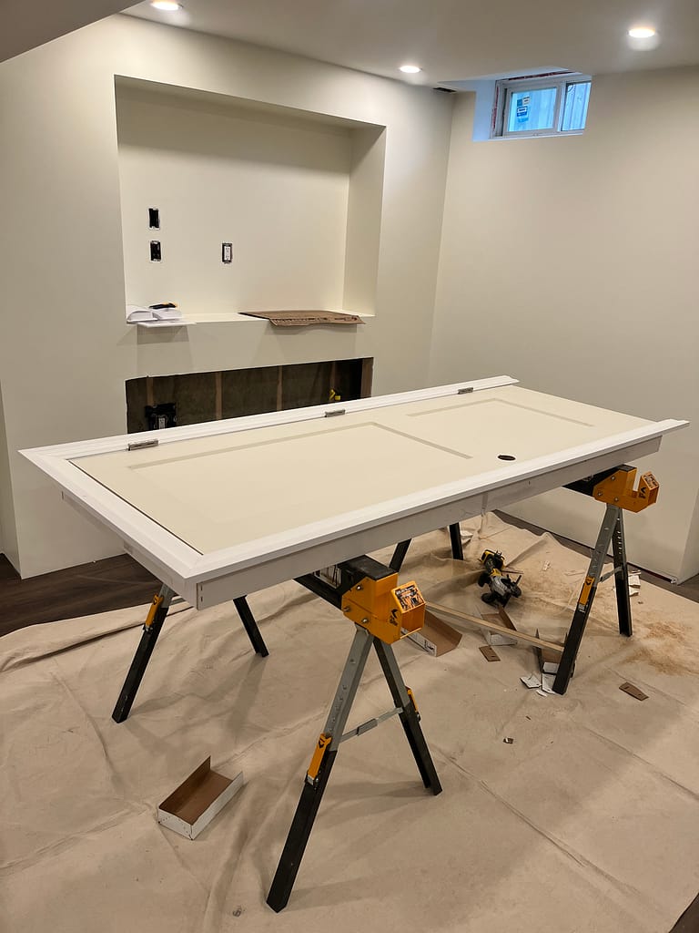 Prehung door prepared with casing around for installation
