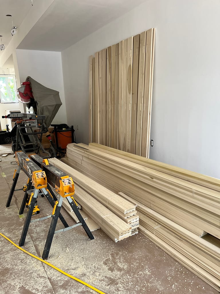 Trims are waiting to be installed by a finish carpenter in Toronto home