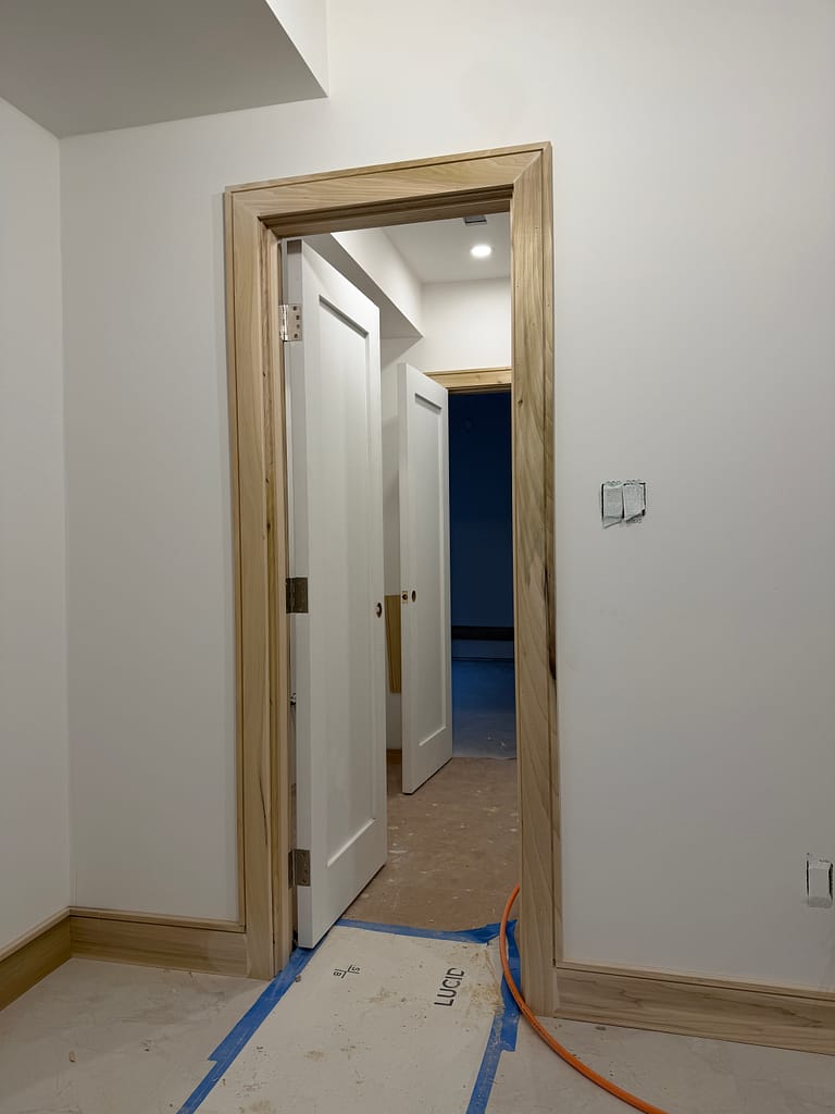 View through multiple interior doorways showing casing alignment in a Toronto home
