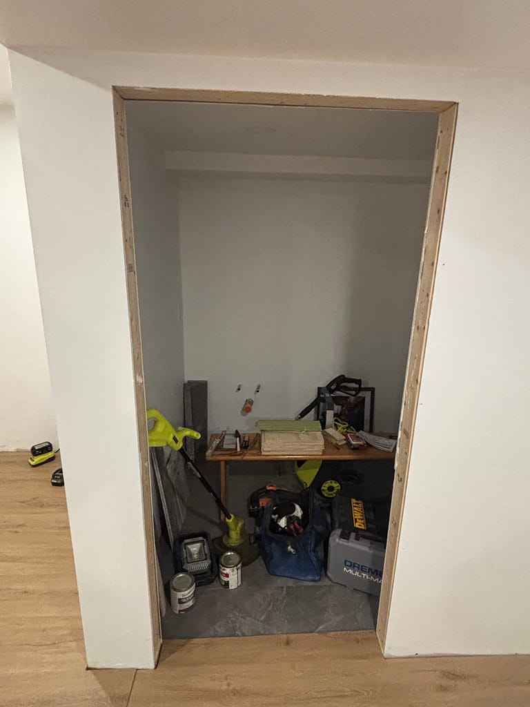 Short rough opening for a basement washroom door before installation in Burlington