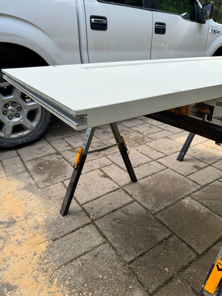 Bottom guide channel prepared for pocket door installation in Oakville