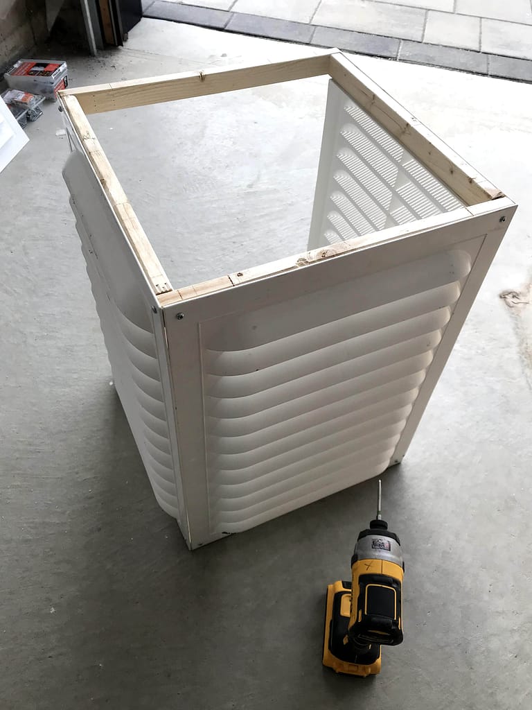 Custom louvered exterior vent snow guard being assembled in Mississauga