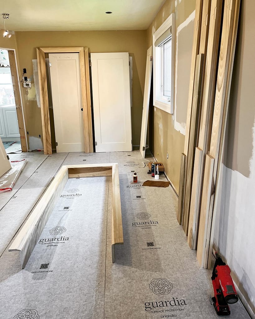 Trim Package and Custom Accent Wall for a Main Floor Renovation in Mississauga carpentry