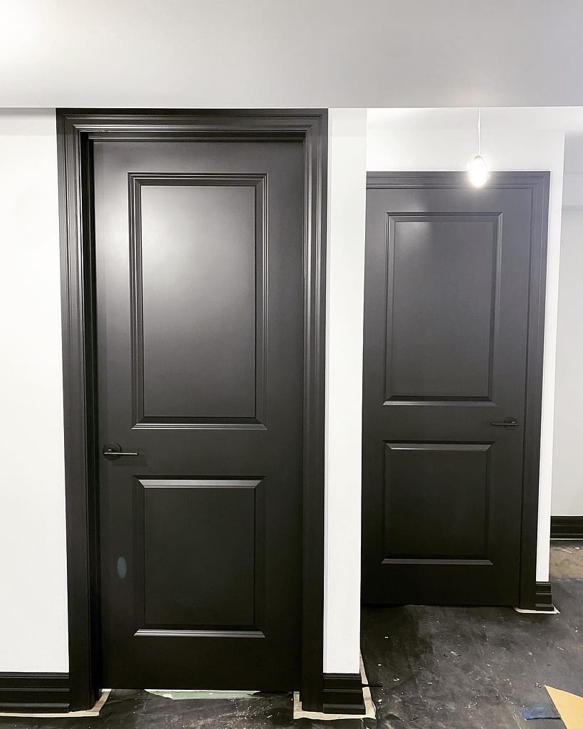 Modern interior doors and trims painted in deep black installed by finish carpenter Jack Cenk Ozer in Vaughan.