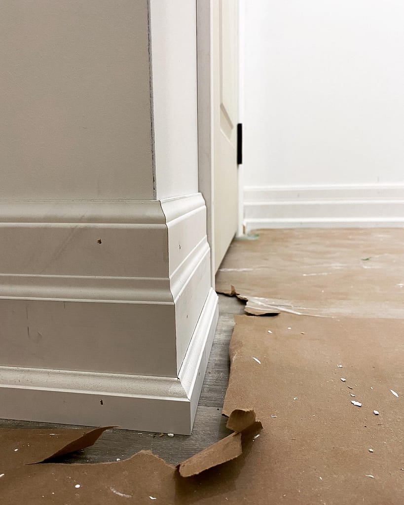 A close detail of a baseboard miter installed by finish carpenter Jack Ozer in Vaughan.