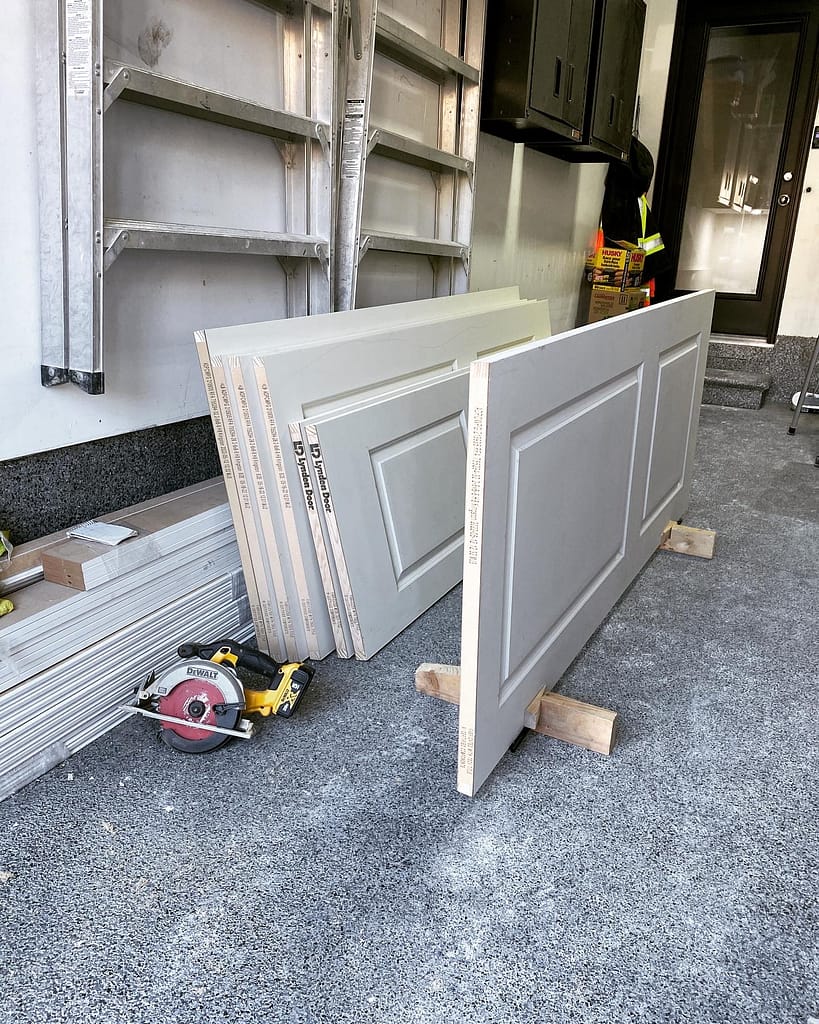 Interior door placed on a work stand for cutting, routing and hardware preparation
