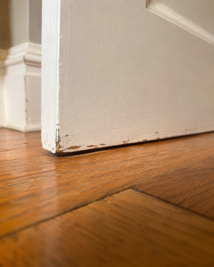 Interior door rubbing on the floor because there is not enough clearance under the door.