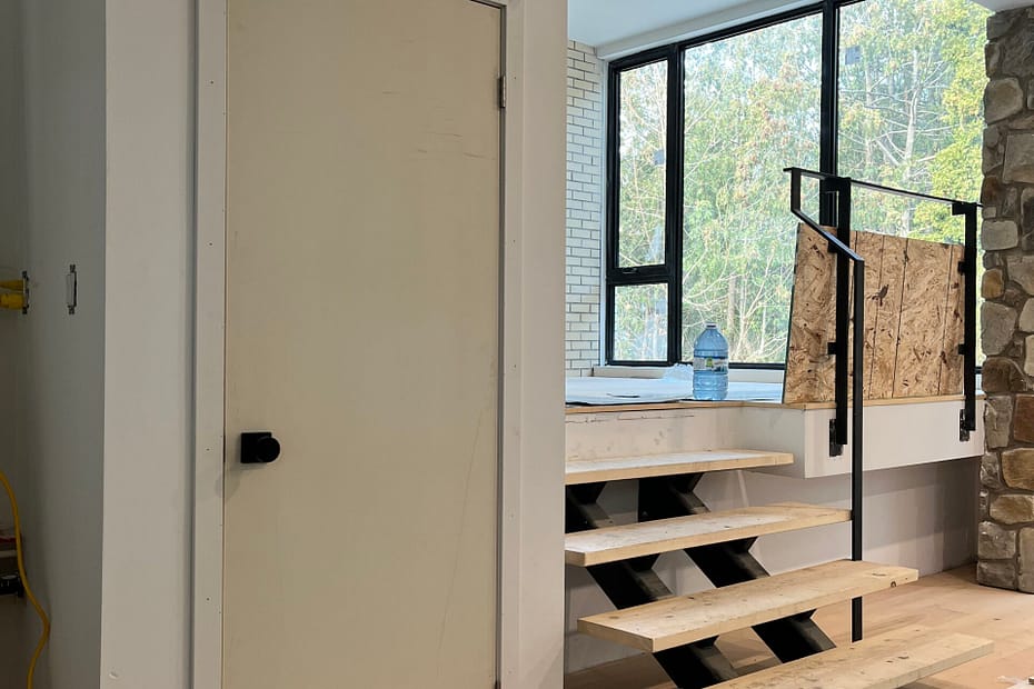 Interior Door Installation and Custom Stair Treads in an Oakville Custom Home carpentry