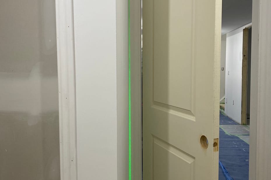 The Reality of New Construction Settlement: Why Sub-Division Doors Stick and Trim Seams Split carpentry