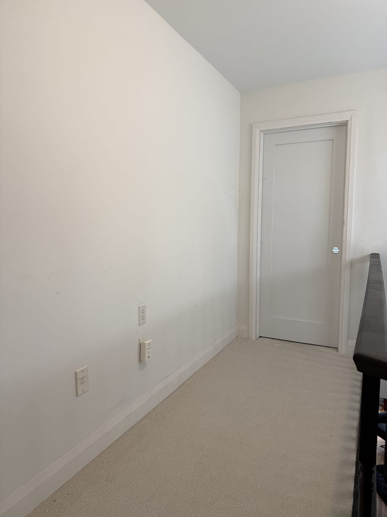 One-panel solid-core shaker doors installed by finish carpenter in Oakville home.
