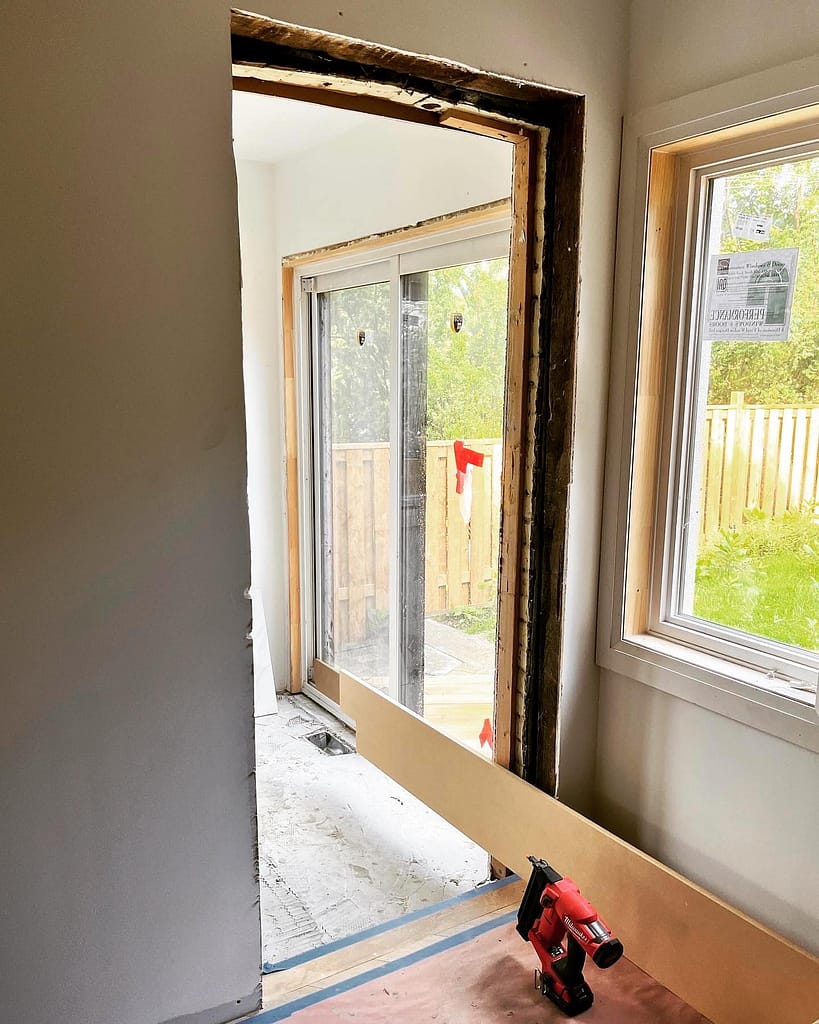 Uneven opening in a plaster wall in an old Cambridge house