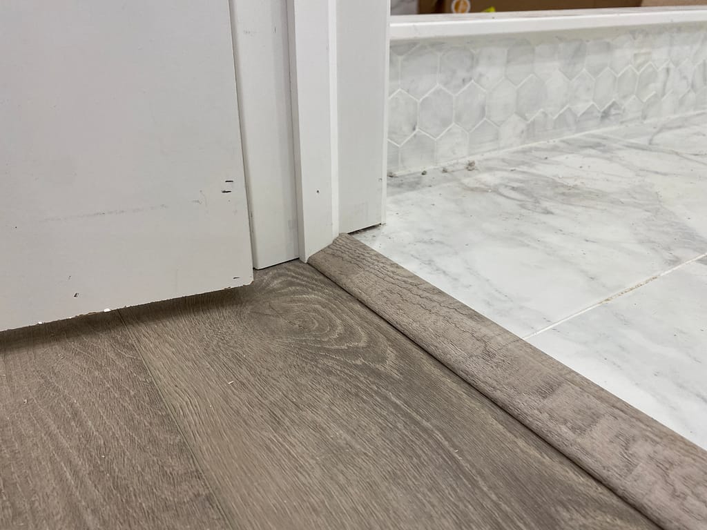 vinyl plank laminate flooring transition after installation in a Hamilton house