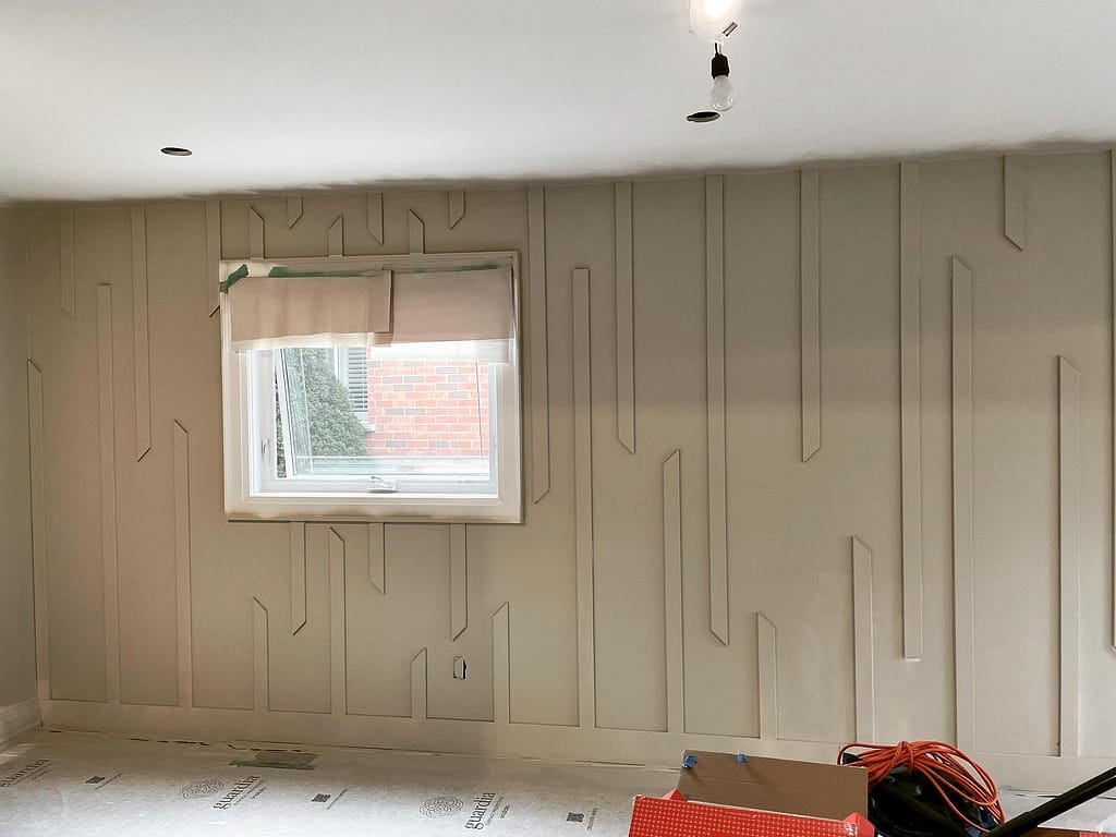 Modern accent wall installed by a finish carpenter in Oakville