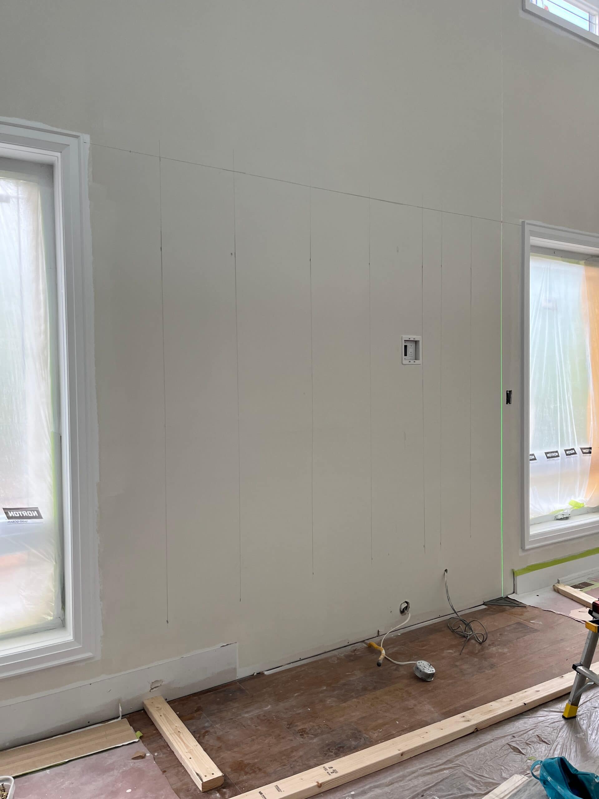 Layout lines marked on the wall for an Oakville fireplace feature wall