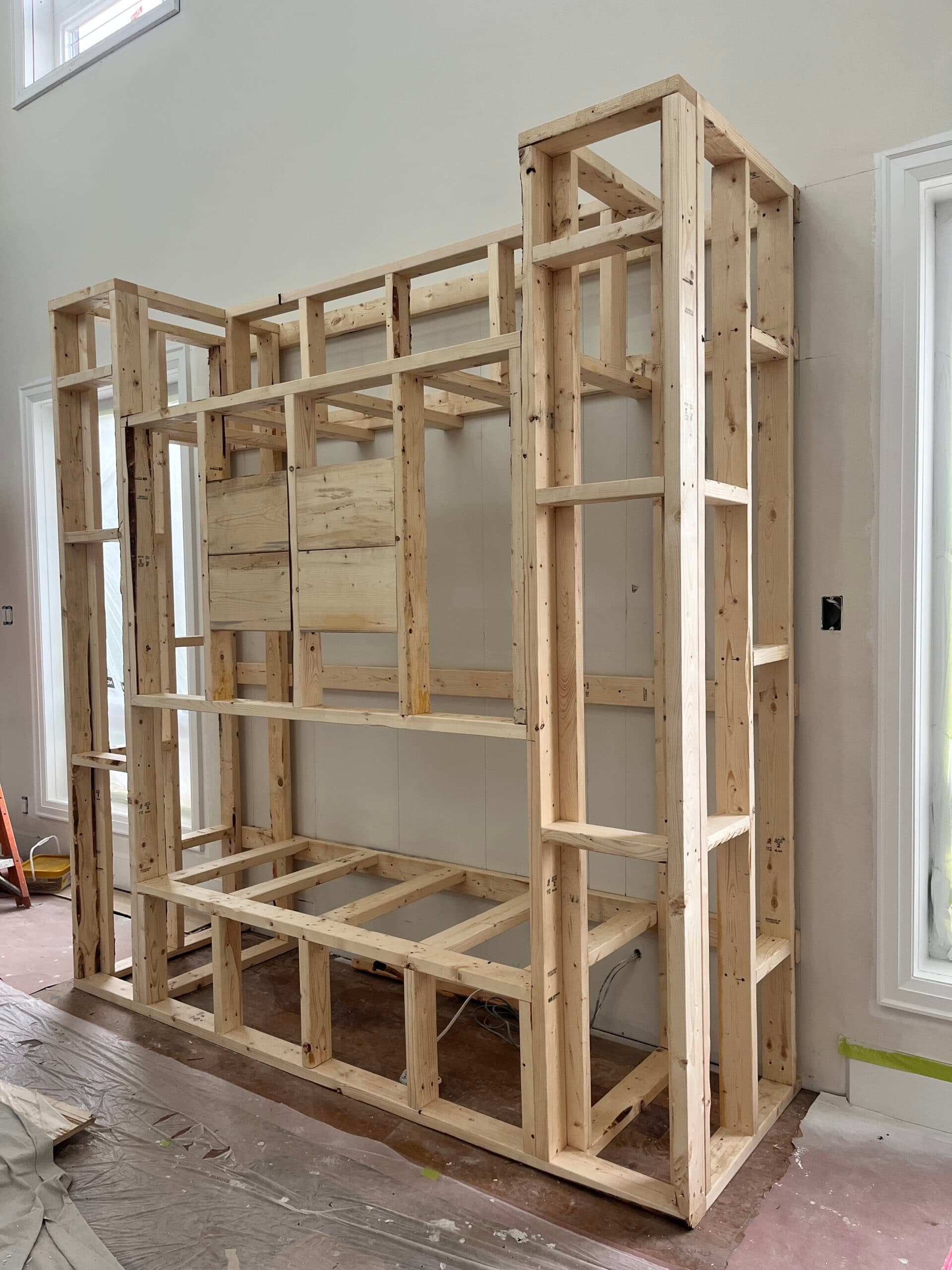 Side view of the fireplace feature wall frame during construction