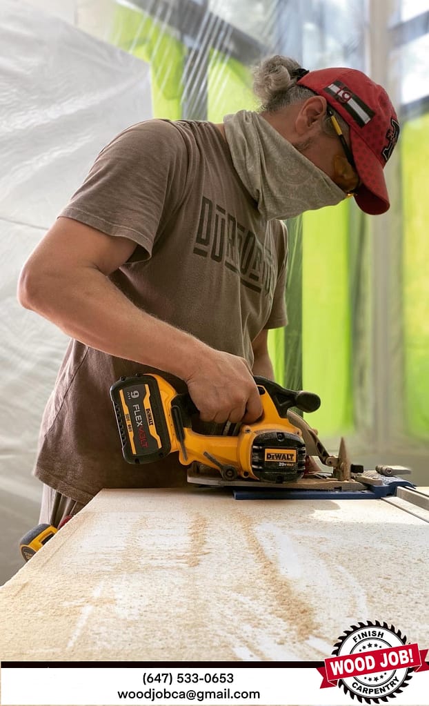 Jack Cenk Ozer working on a door resizing porject inside a home
