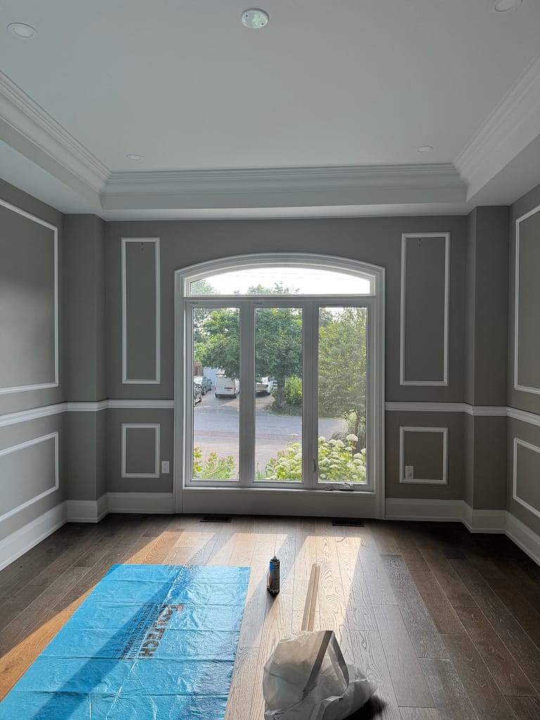 wall panel trim installed by a finish carpenter in Burlington home