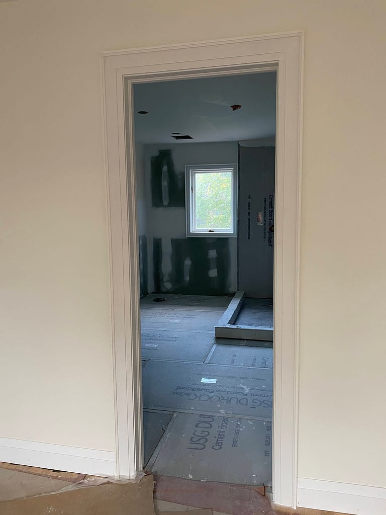 Door jamb and casing installed by a finish carpenter in Oakville home