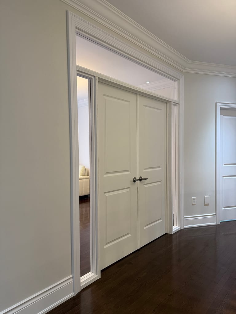 A double door and transom installed by a finish carpenter in Vaughan home.