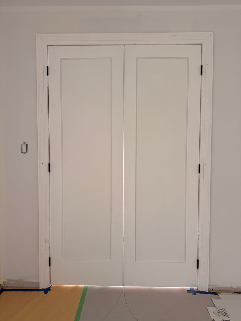 Interior solid doors and casings detail installed by a Toronto finish carpenter