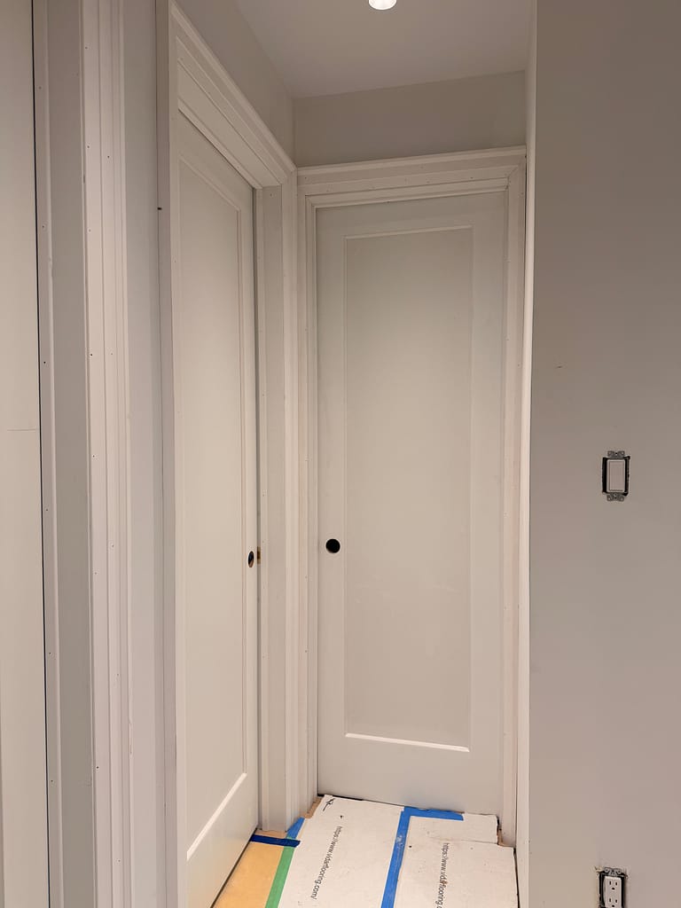 Solid interior doors with casing installed in a Toronto home