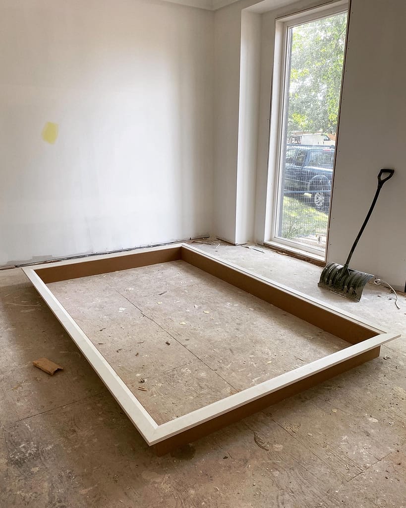 the finish carpenter prepared a custom jamb and casing for an oversized window in Oakville home