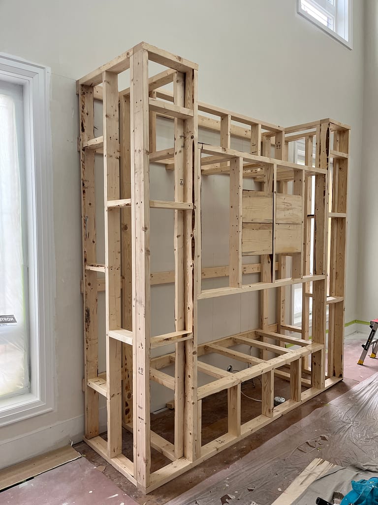 Angled view of the completed fireplace feature wall frame