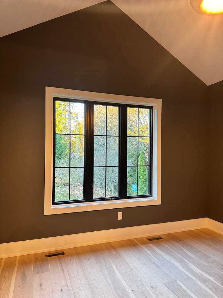 Window casing and baseboard installed by a finish carpenter in Vaughan home.