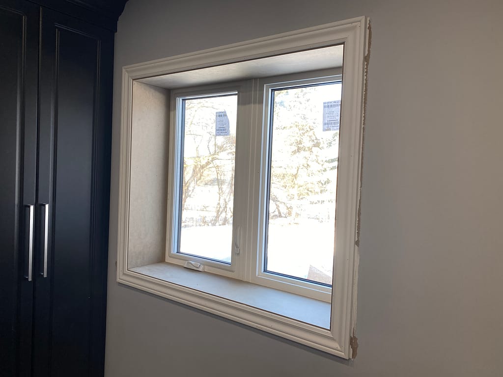 window extension and trim installed by a finish carpenter at Wood Job Finish Carpentry in a Caledon home basement