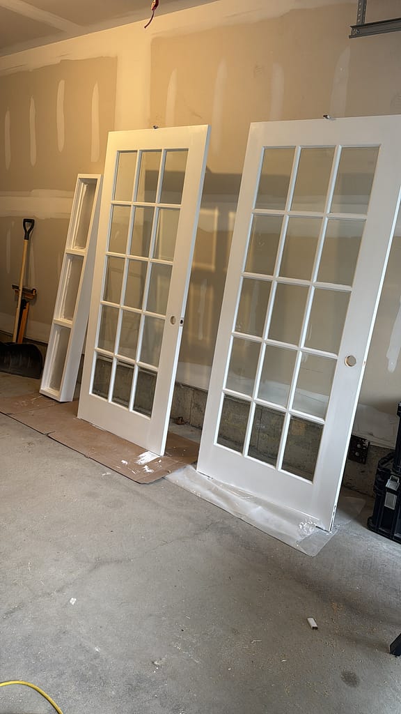 french doors and transom prepared by a finish carpenter at Wood Job Finish Carpentry in Oakville