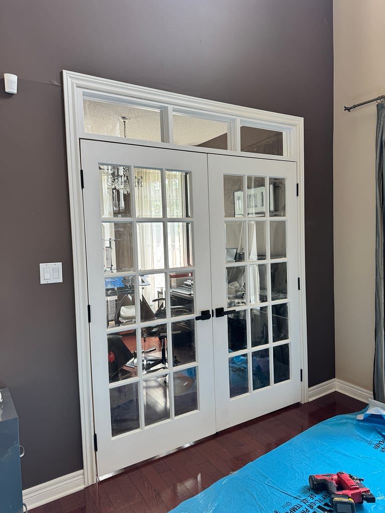 french doors and transom installed by a finish carpenter at Wood Job Finish Carpentry in Oakville