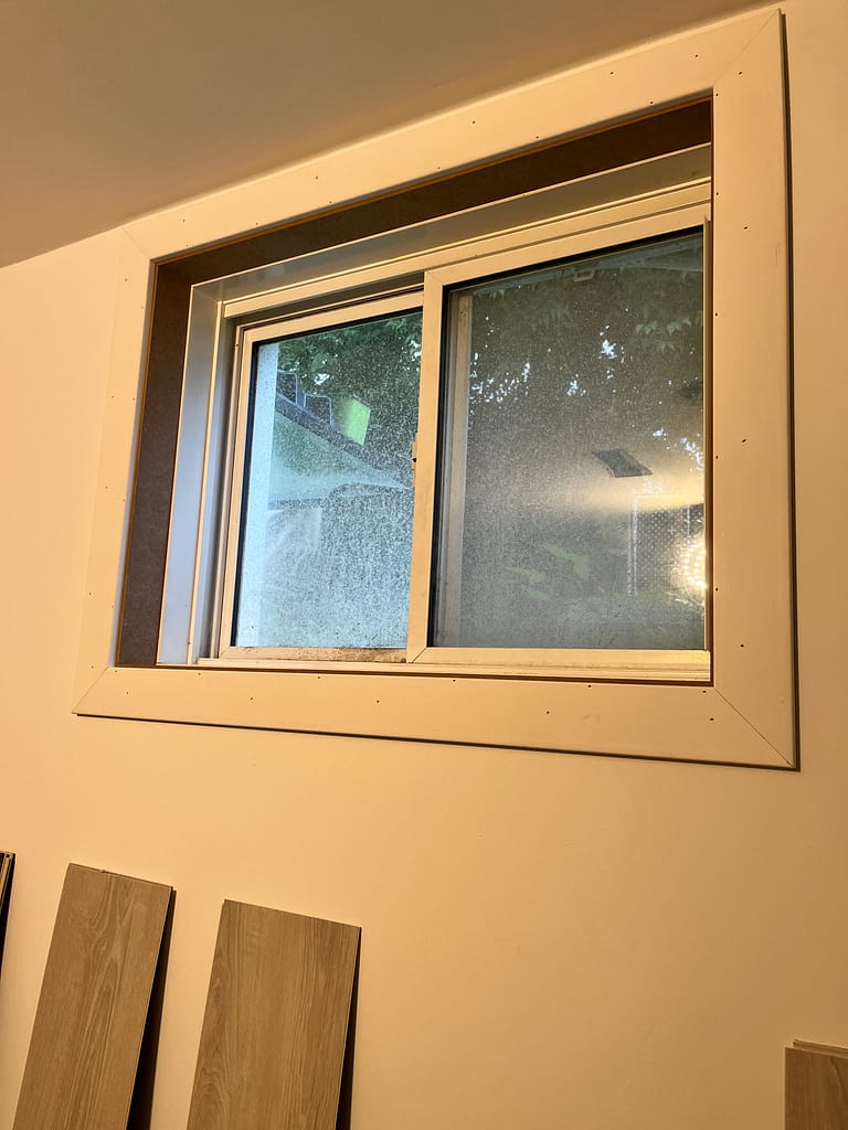 customized window jamb and casing installed by a finish carpenter at Wood Job Finish Carpentry in Milton basement renovation