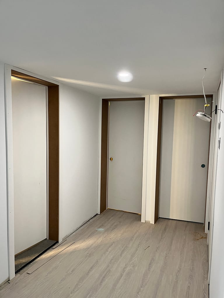 customized door jambs and resized door installed by a finish carpenter at Wood Job Finish Carpentry in Milton basement renovation