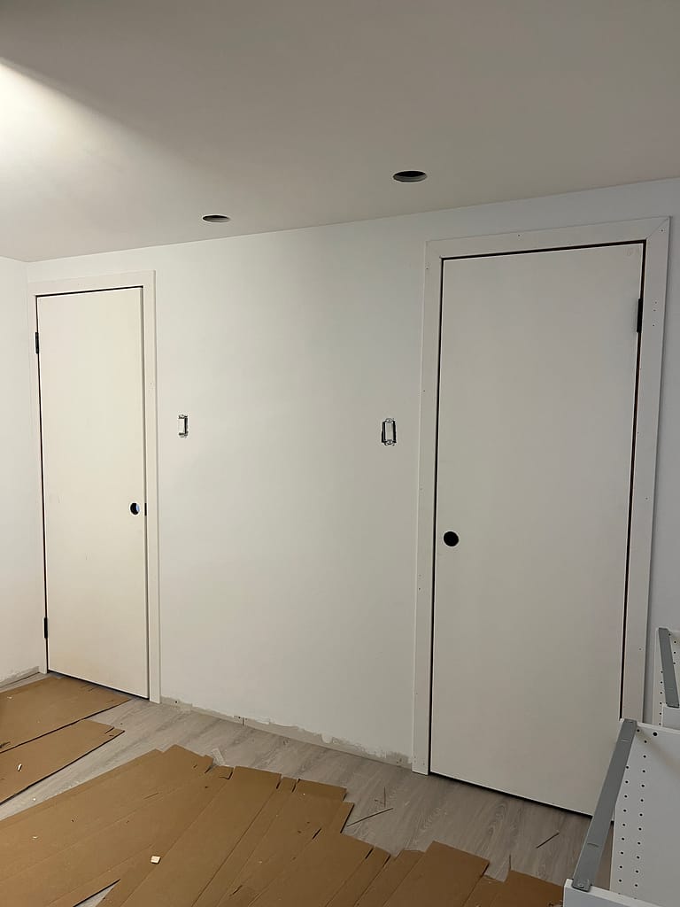 customized door jambs and resized door installed by a finish carpenter at Wood Job Finish Carpentry in Milton basement renovation
