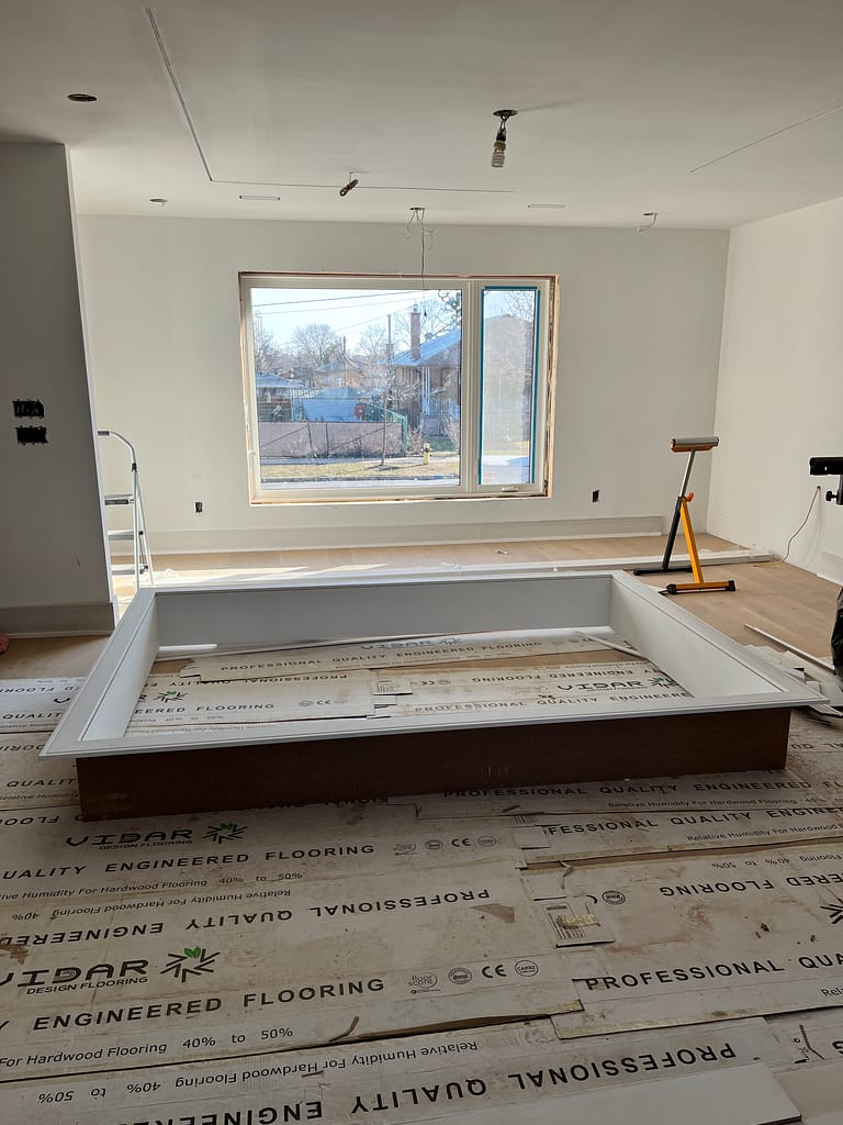 window extension and casings prepared for installation by a finish carpenter at Wood Job Finish Carpentry in a Toronto bungalow renovation