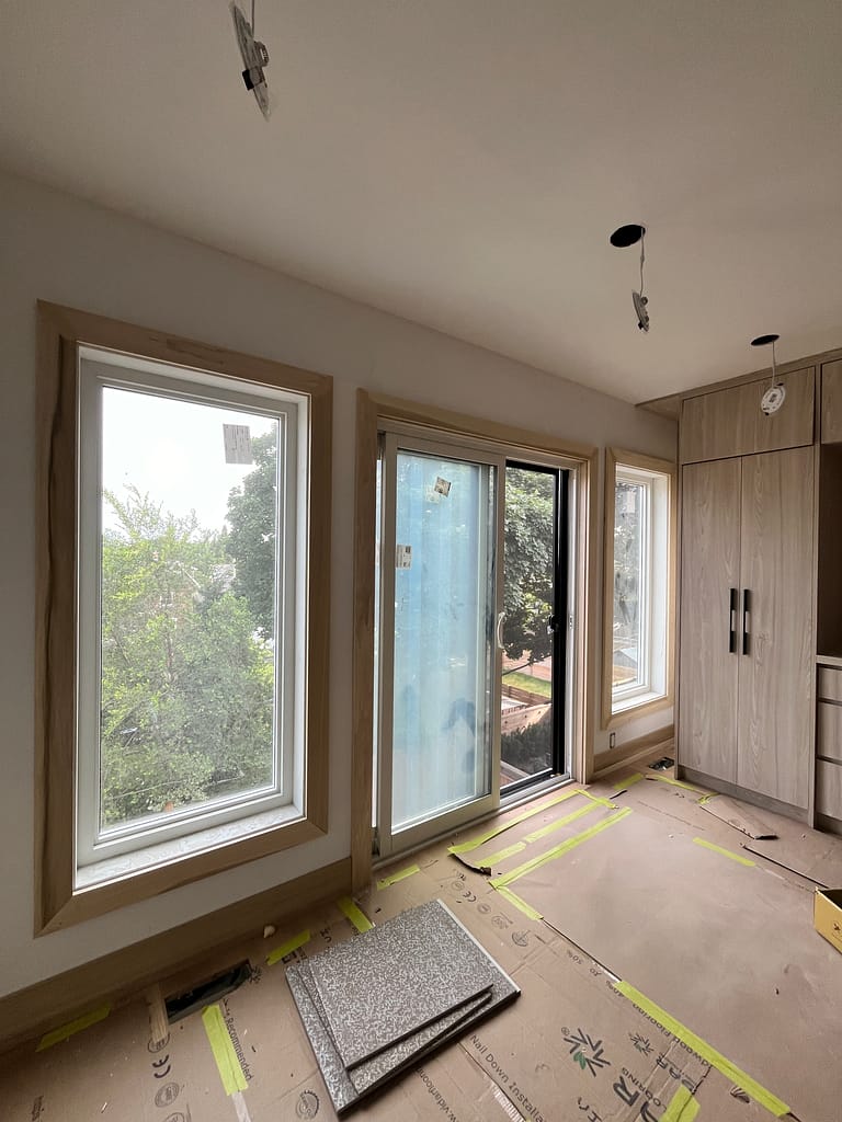 solid doors, window trim, and baseboards installed by a finish carpenter at Wood Job Finish Carpentry in a Toronto house