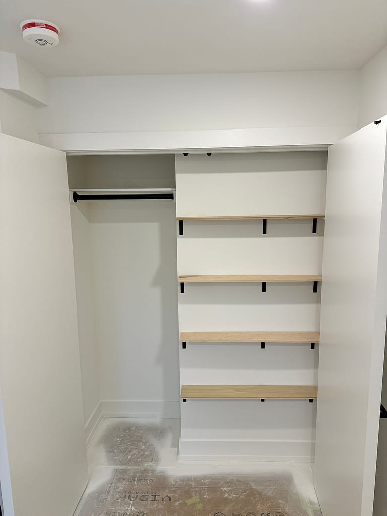 solid doors, trim, baseboards, and built-in closets installed by a finish carpenter at Wood Job Finish Carpentry in a Toronto house