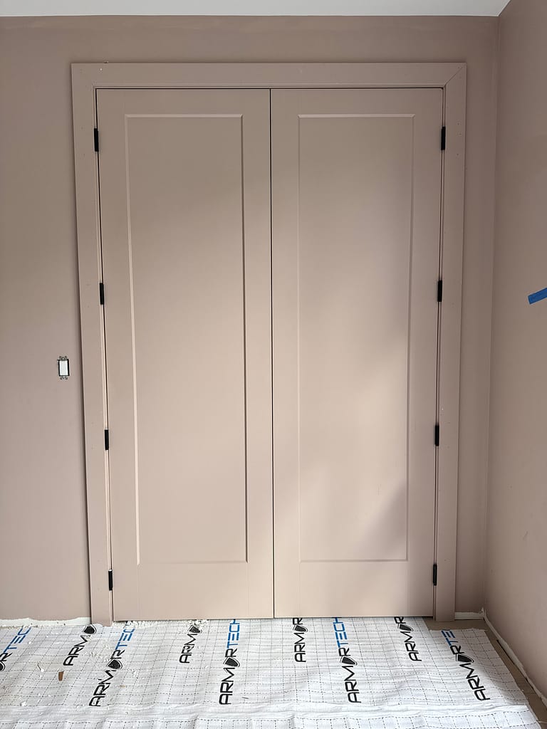 interior solid doors installed by a finish carpenter at Wood Job Finish Carpentry in a Cambridge custom home