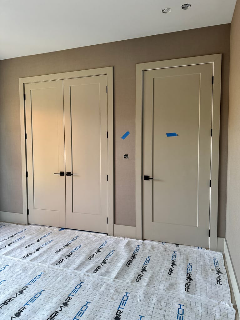 interior solid doors and trims installed by a finish carpenter at Wood Job Finish Carpentry in a Cambridge custom home