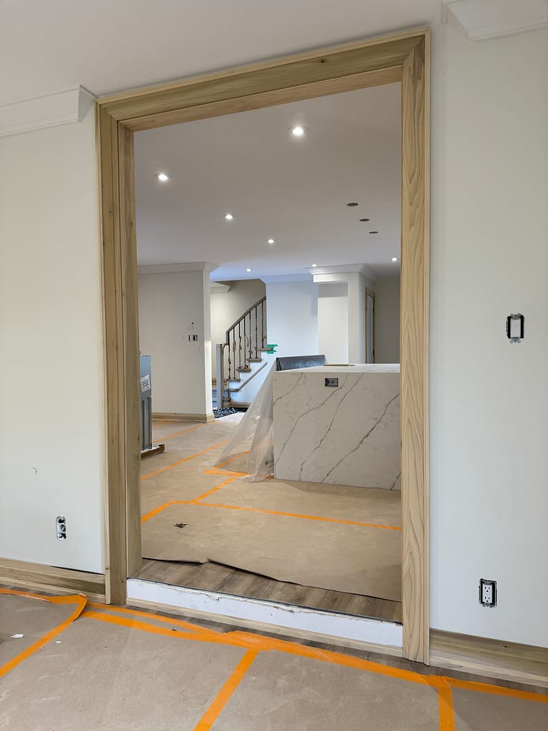 ab archway and trim installed by a finish carpenter at Wood Job Finish Carpentry in a Milton home