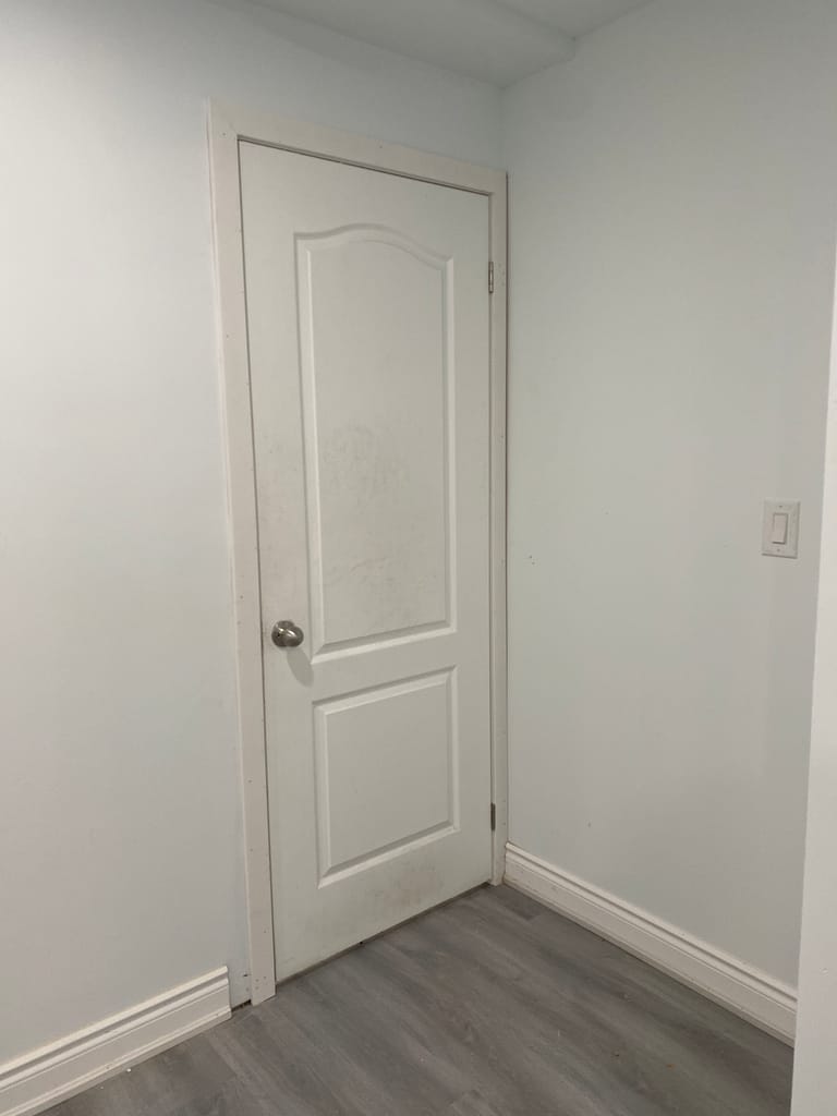 Correctly installed interior door and trim detail by Wood Job Finish Carpentry in Kitchener