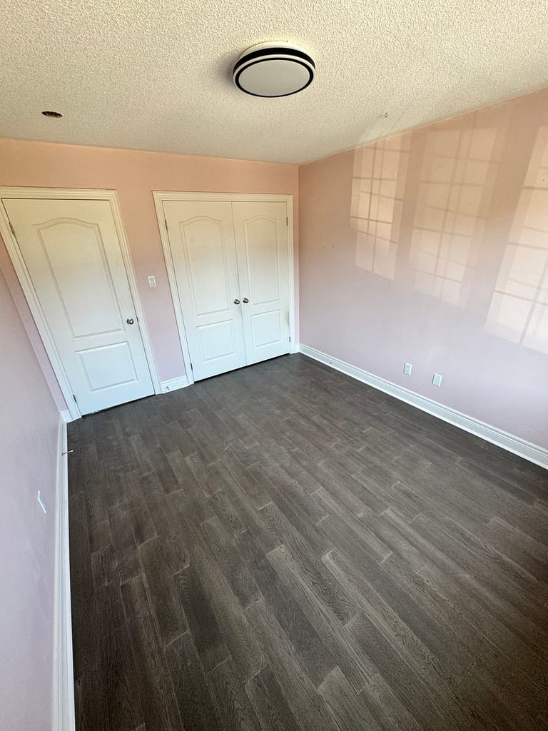 Completed hardwood flooring renovation in Brampton home